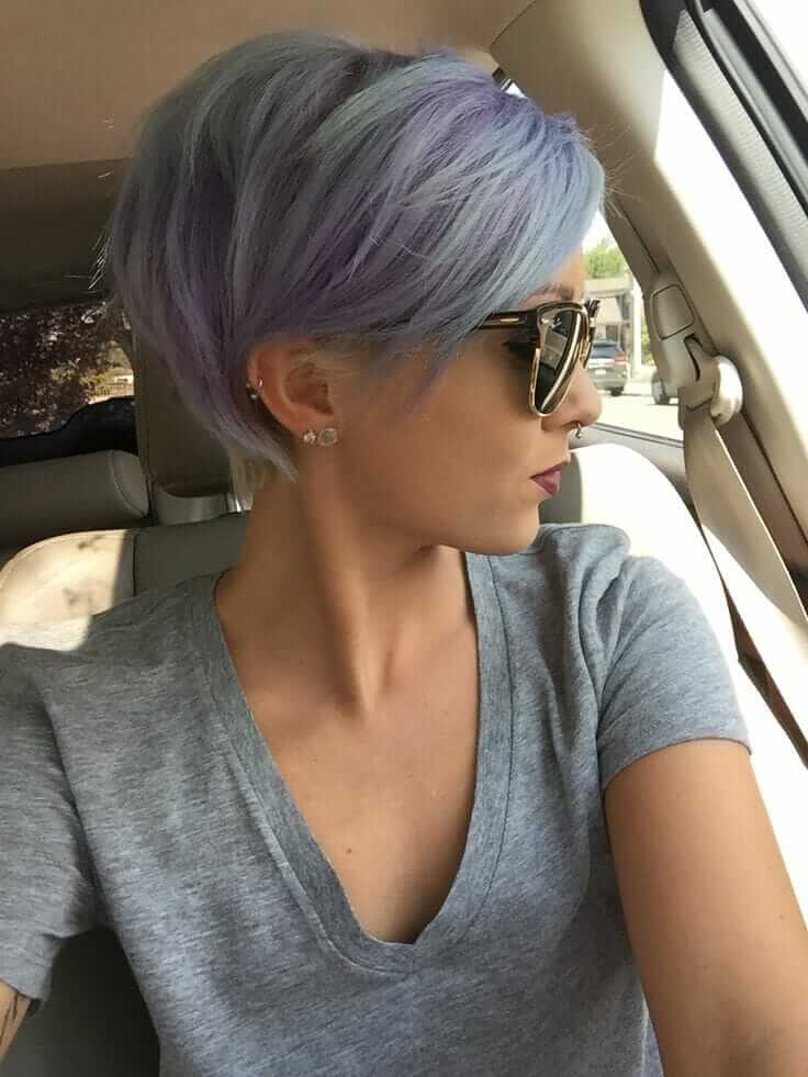Short pixie hairstyle with dyed pastel purple and blue colors