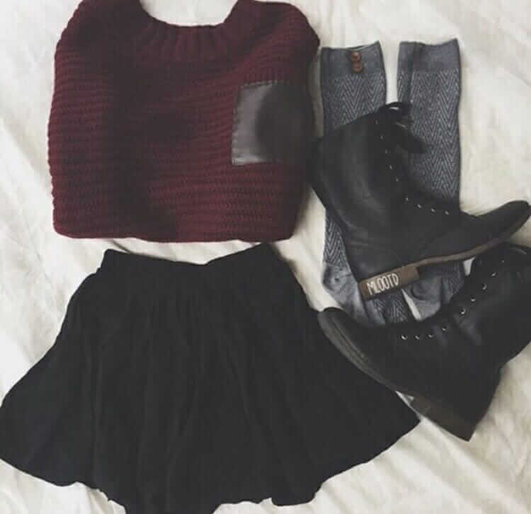 Grunge outfit idea nº1: Red sweater, combat boots, knee socks, and a simple black skirt