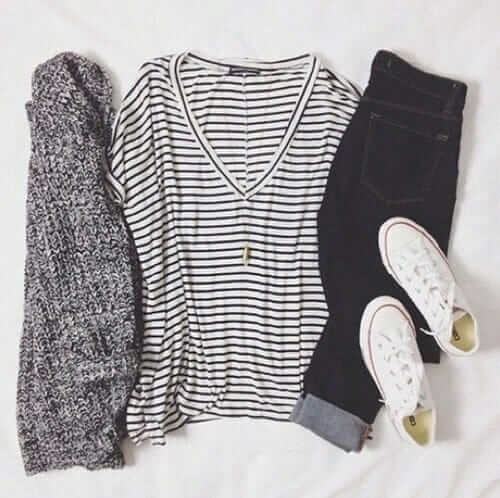 Grunge outfit idea nº11: Striped V-neck T, chunky scarf, dark rolled denim jeans, and white low-cut Converse all-stars