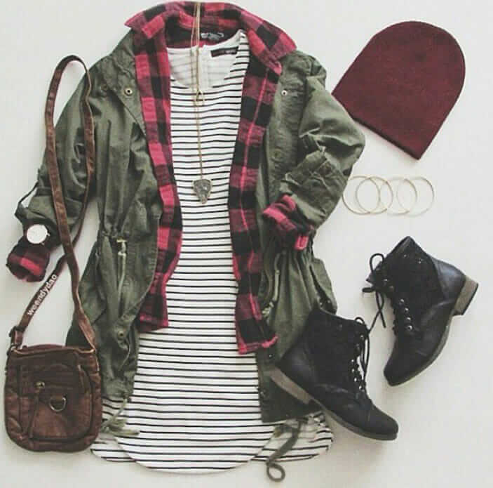 Grunge outfit idea nº16: Red plaid shirt, striped dress T, green canvass jacket, red beanie, black laced boots, brown leather bag, and matching accessories