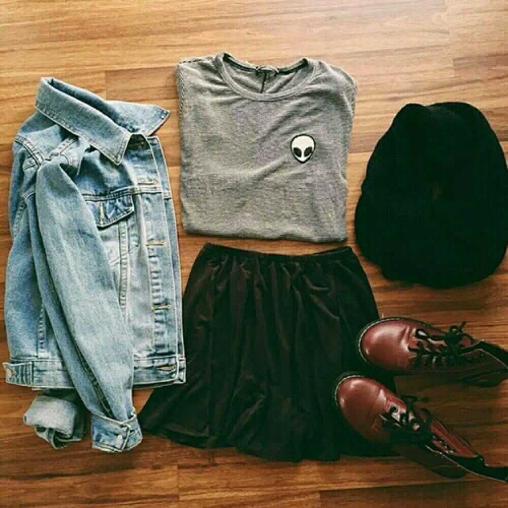 Grunge outfit idea nº3: Alien shirt, denim jacket, black scarf, and maroon combat boots