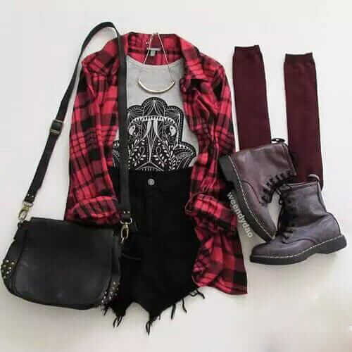 Grunge outfit idea nº4: Flannelette shirt, black ripped jean shorts, studded handbag, maroon knee highs, combat boots, and a half bangle necklace
