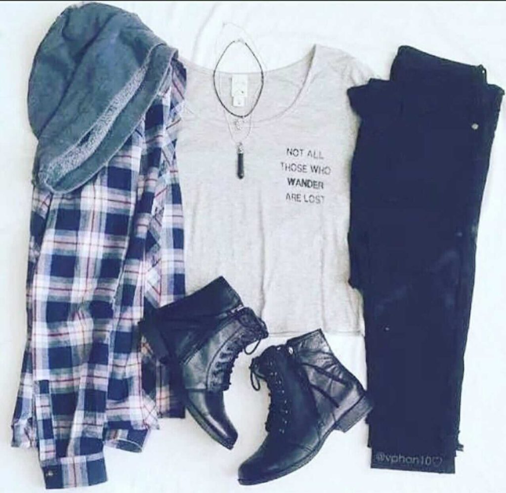 Grunge outfit idea nº6: Flannel shirt, boots, black jeans, light grey sleeveless undershirt, and black crystal necklace