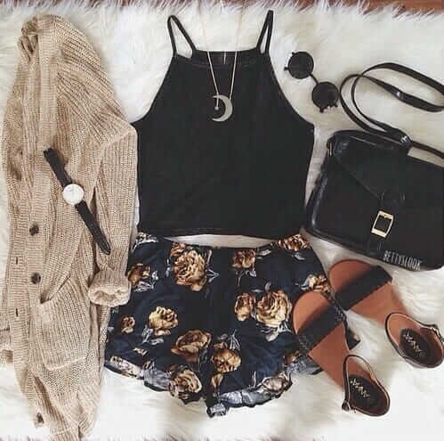 Grunge outfit idea nº8: Floppy cardigan, floral shorts, one strap sandals, black handbag, round shades, brown watch, crescent necklace