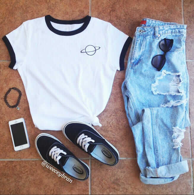 7. White T with washed out blue ripped jeans, classic Vans, and black shades