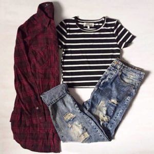 Dark flannel shirt striped cotton t shirt and ripped jeans