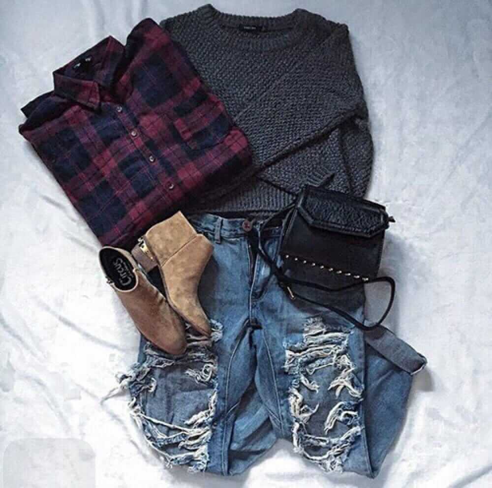 Flannelette, smoke knitted sweater, ripped blue jeans, brown ankle booties and black handbag