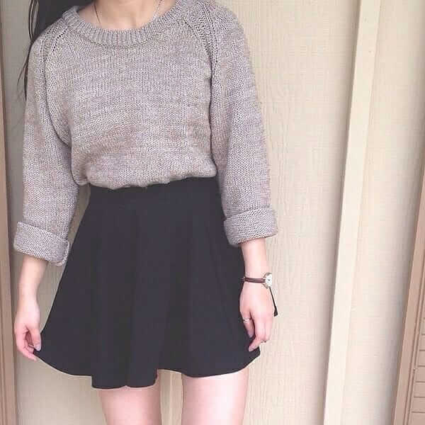 Gray crewneck sweater with a black skater skirt