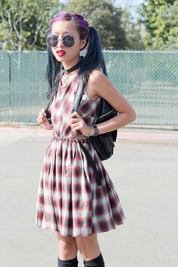 Grunge girl wearing cool plaid dress