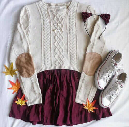 13. Cable knit sweater with a maroon skirt, white Chucks, and a cute maroon rose bud head band