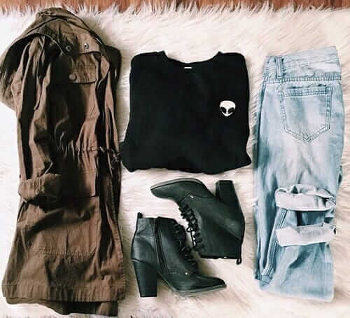15. Black T, blue jeans, black lace up heel boots, and a brown Parka