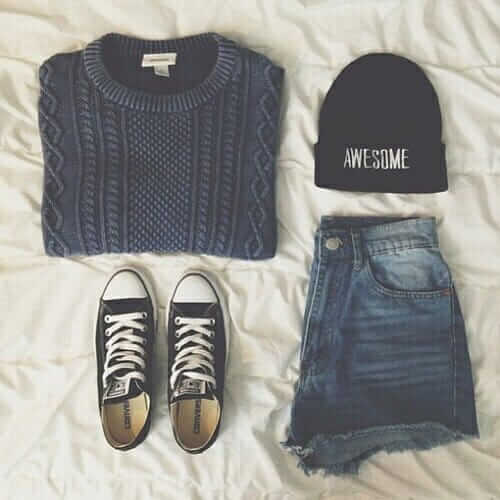 16. Dark charcoal gray cable knit sweater, Chuck Taylors, dark jean shorts, and a black beanie