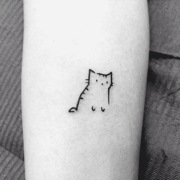 Little forearm tattoo of a cat
