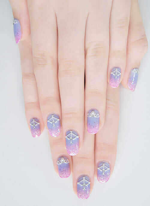Pastel ombre gradient stiletto nails with glitter