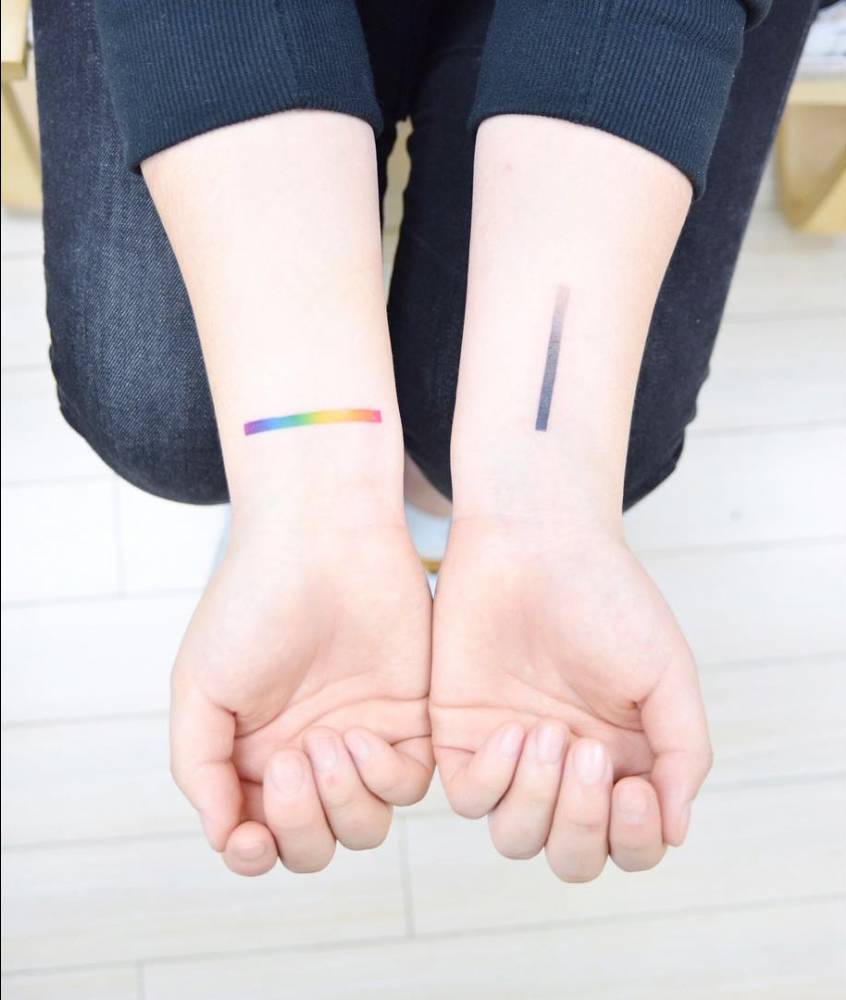 Spectrum Tattoos on the wrists