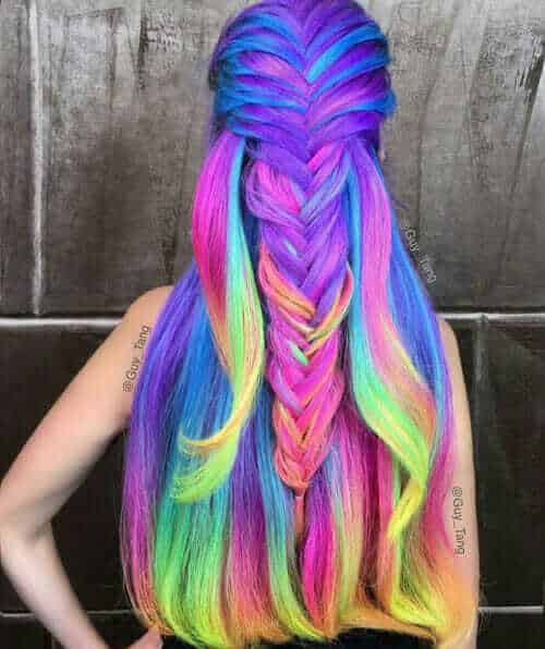 Long rainbow hairstyle with boxer braid by Guy Tang
