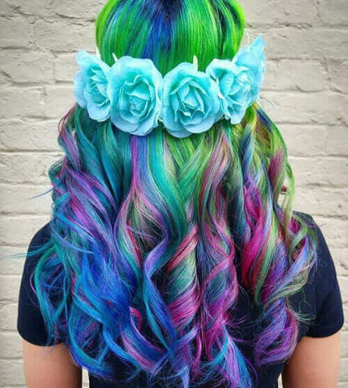 Curly Rainbow hair with blue flowers crown by hairbyjessysilva