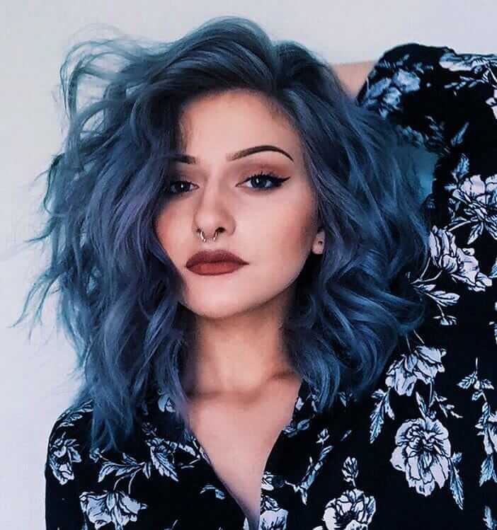 Short curly blue hair style with Lime Crime Unicorn Blue Smoke dye by kimmyschram