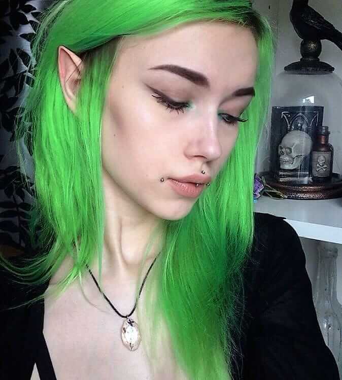 Medium length neon green hair dye by larinamayner