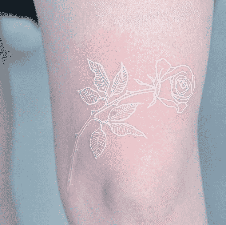 Rose tattoo made in white ink