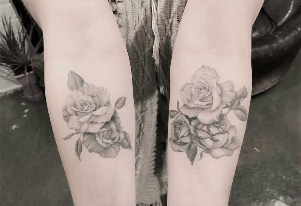 Rose tattoos on upper arms with shade by _dr_woo_