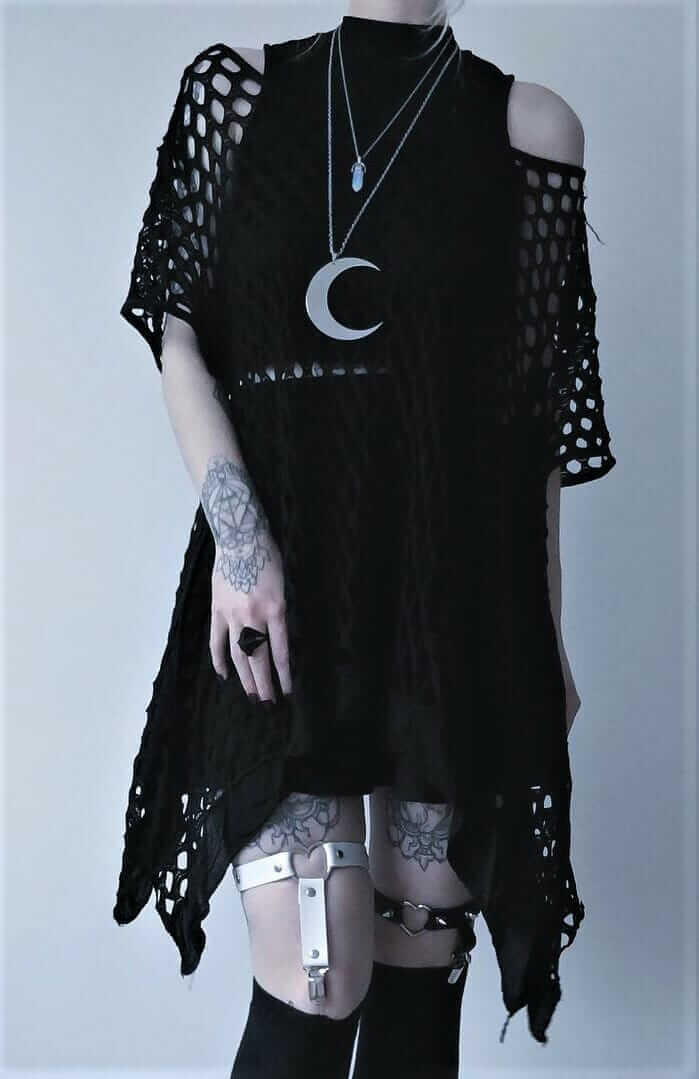 Witchy outfit idea: moon pendant necklace with black dress, under crop top, skater skirt & garter belt by kibbipixel