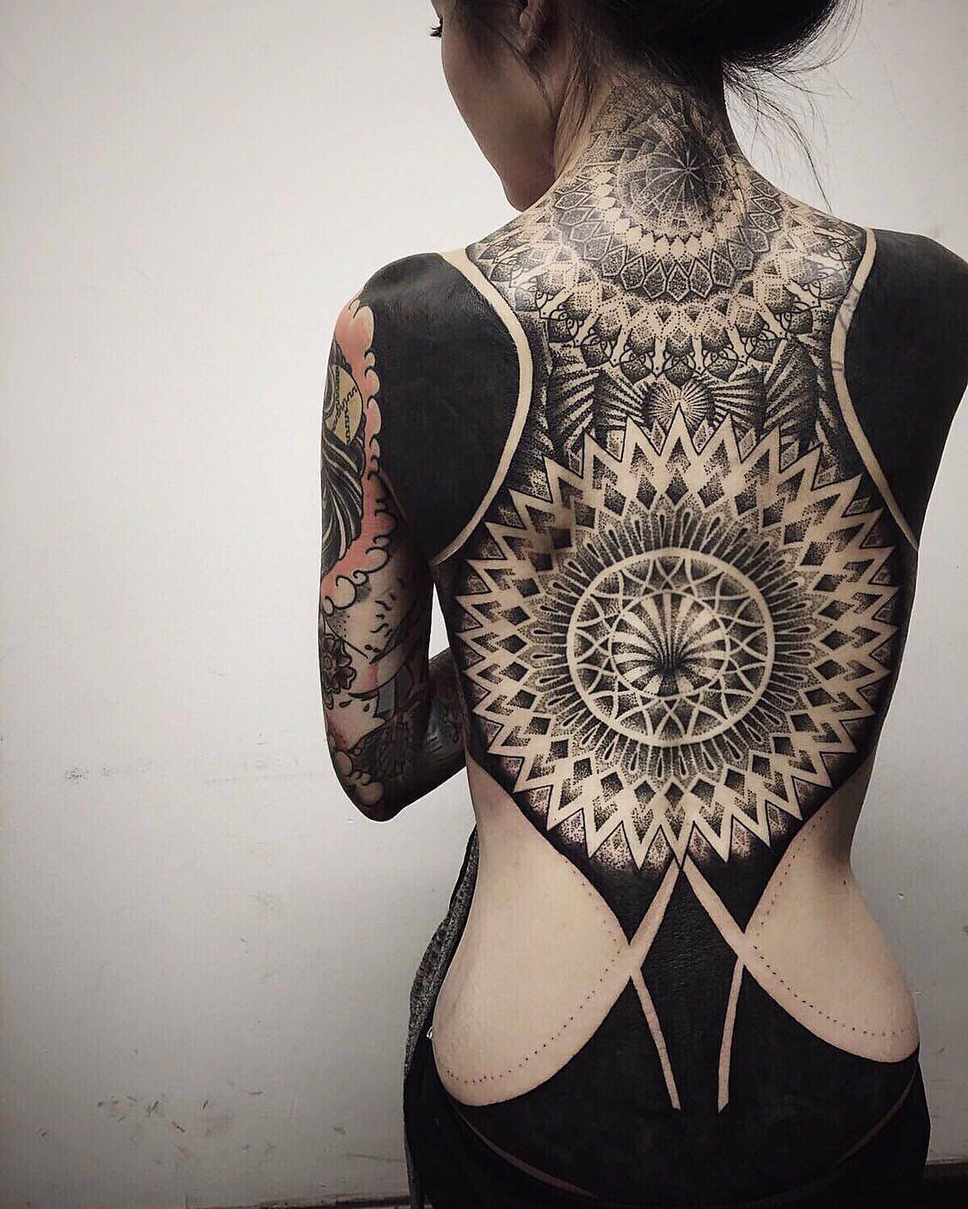 Coverup sacred geometric back tattoo by oddtattooer