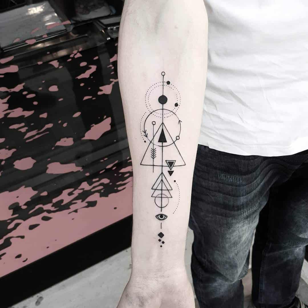 Geometric arm tattoo with alchemy linework by matteonangeroni