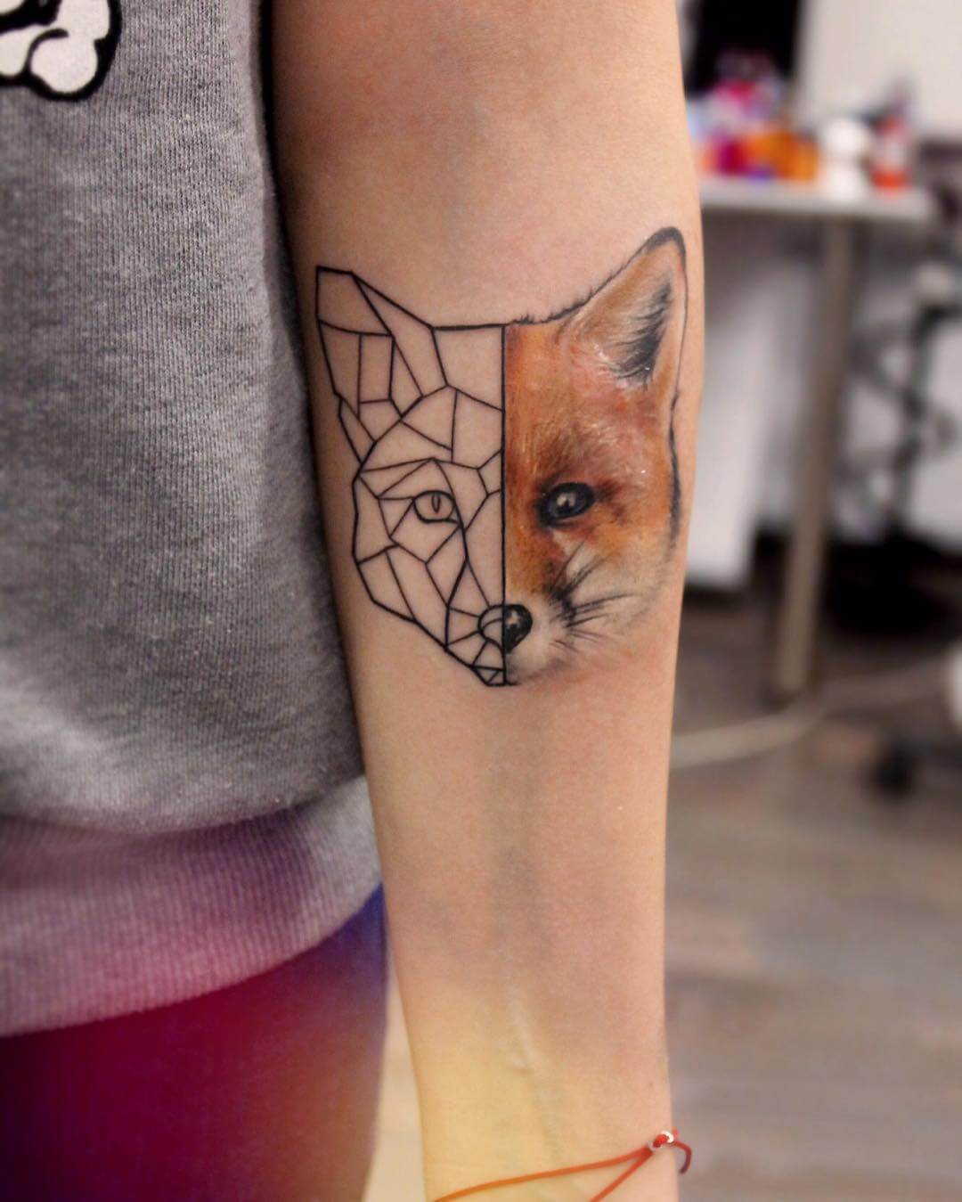 Geometric half fox head arm tattoo by yershova_anna