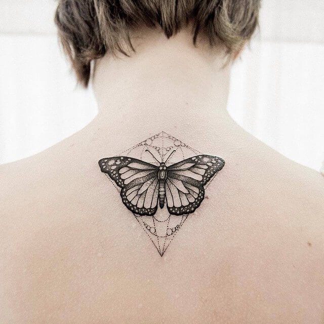 Geometric butterfly back tattoo by dogma_noir