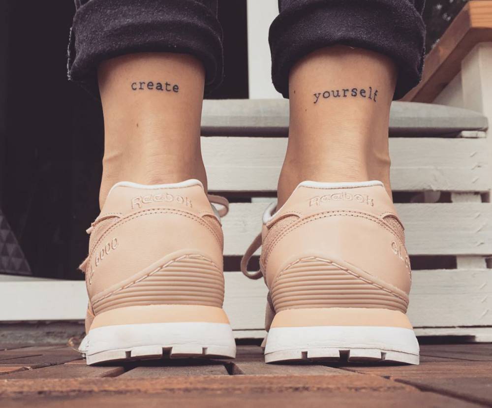 "Create yourself" ankles quote tattoo