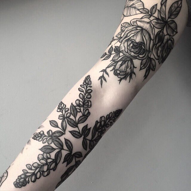 Black & white roses sleeve tattoo