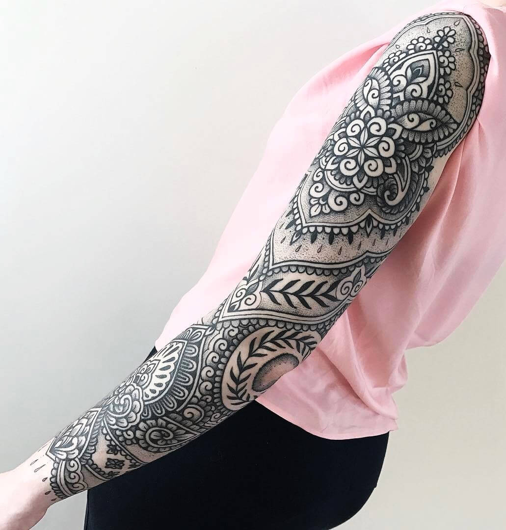 Black & white mehndi style sleeve tattoo