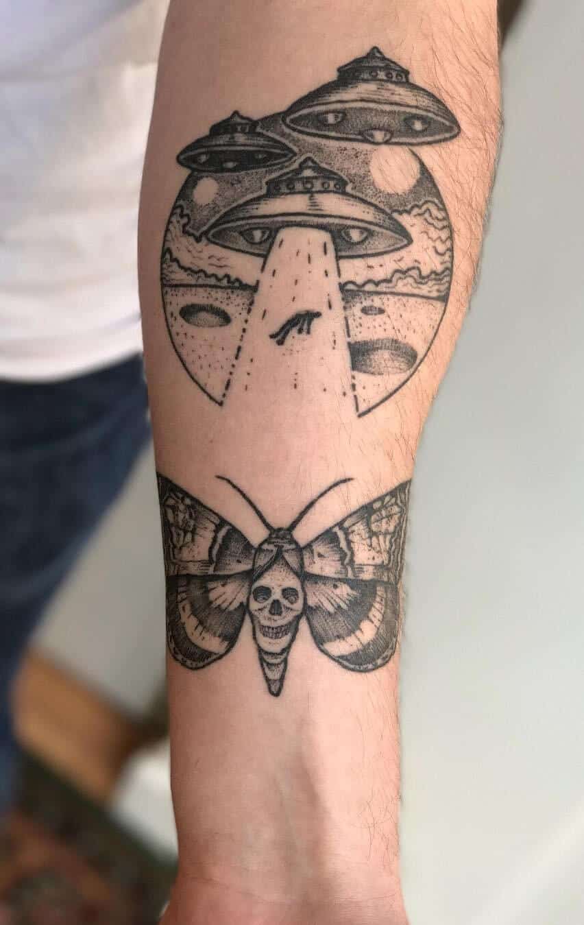Spaceship abduction arm tattoo by tomtomtatts