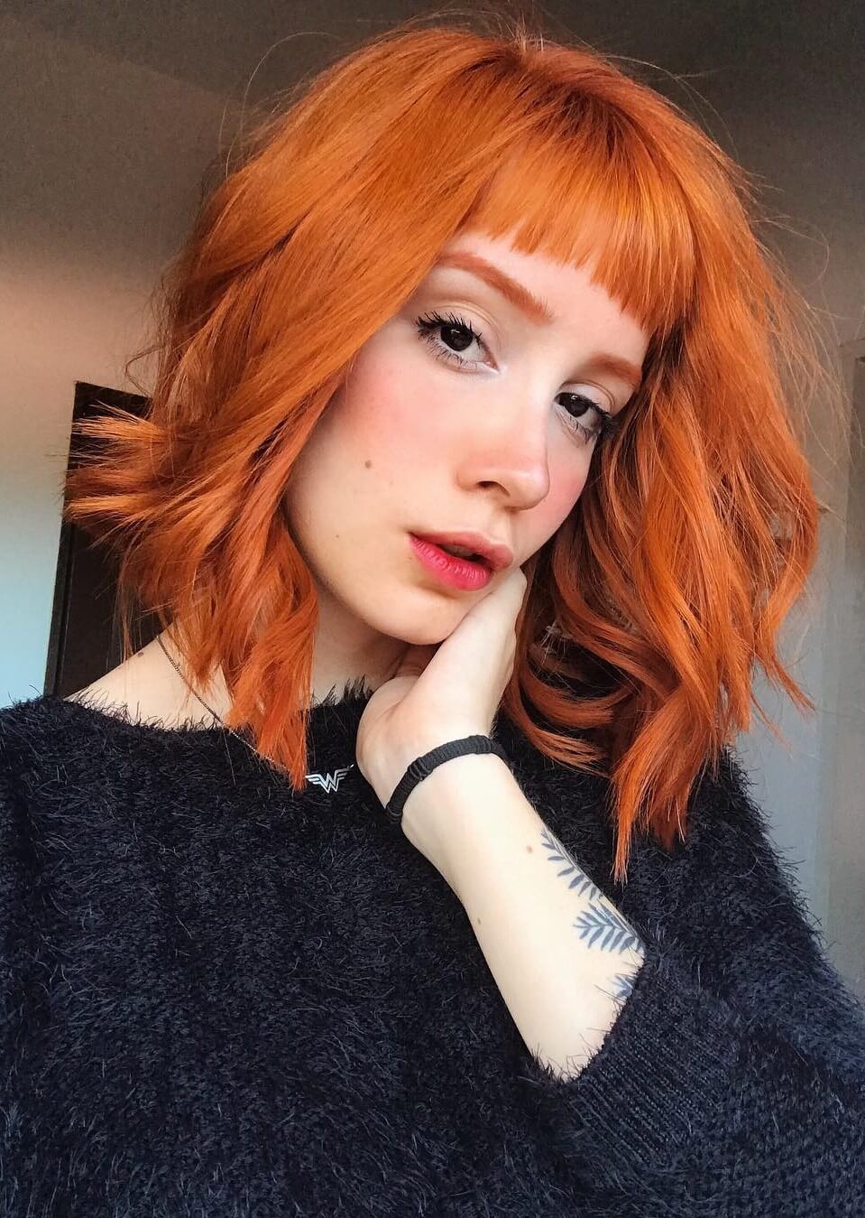 Orange hair with bangs haircut by mmiruiz