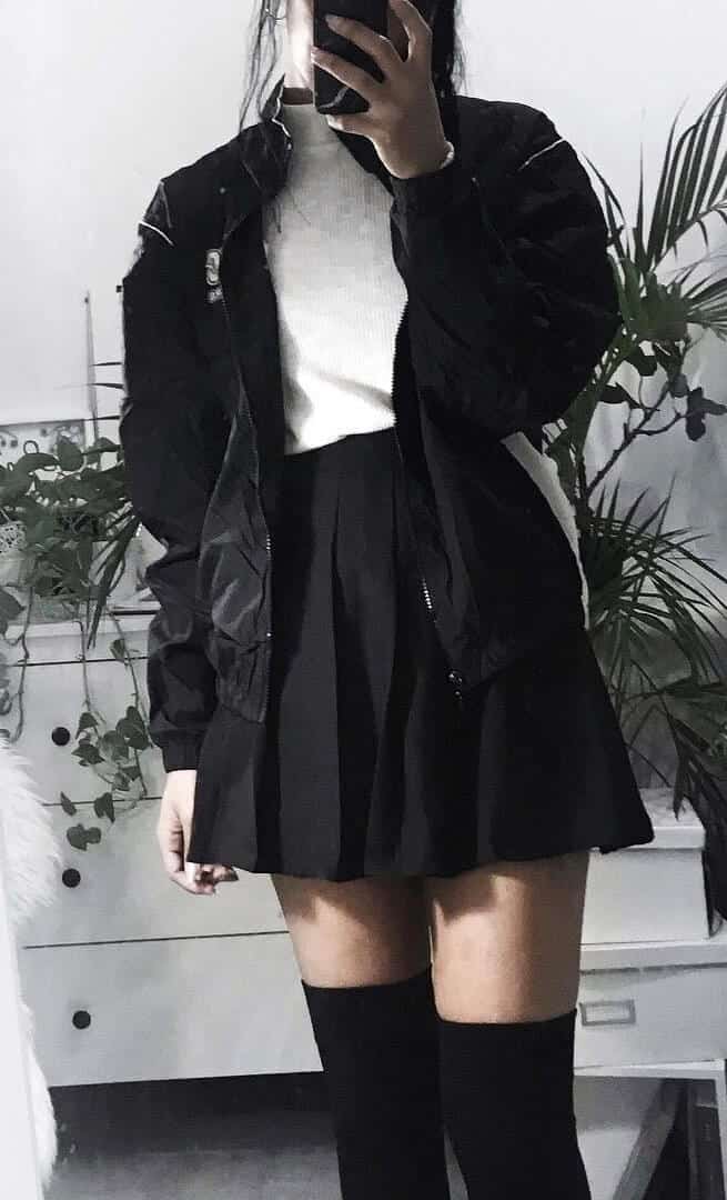 Black bomber jacket with white knitted top, black tennis skirt & high knee socks by cooltured