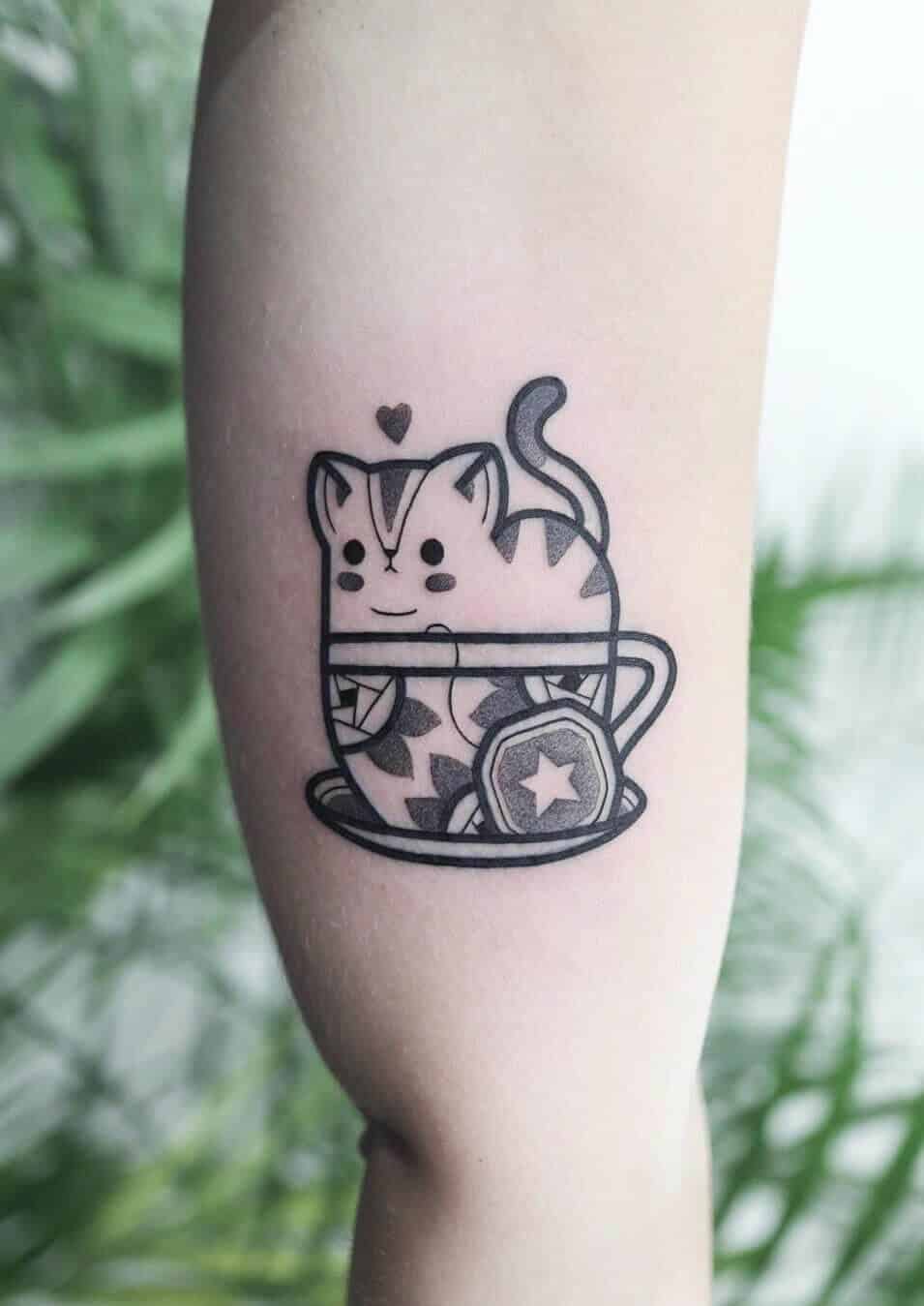 Cat in a cup tattoo