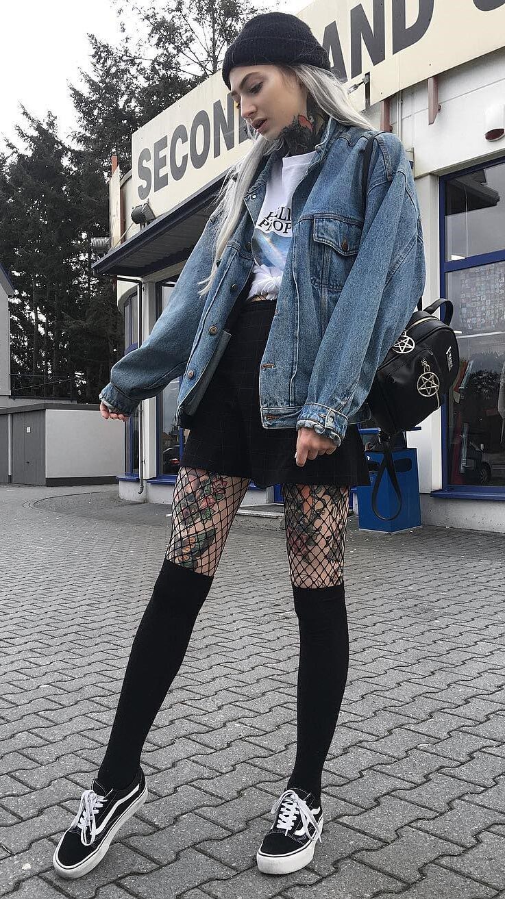 Fall grunge outfit idea: black beanie with denim jacket, printed top, high waist mini skirt, fishnet tights, long black socks & Vans shoes by internetxdoll