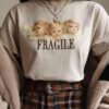 "Fragile" Angels Print Shirt